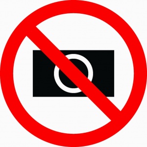 Ženklas Fotografuoti ir filmuoti draudžiama